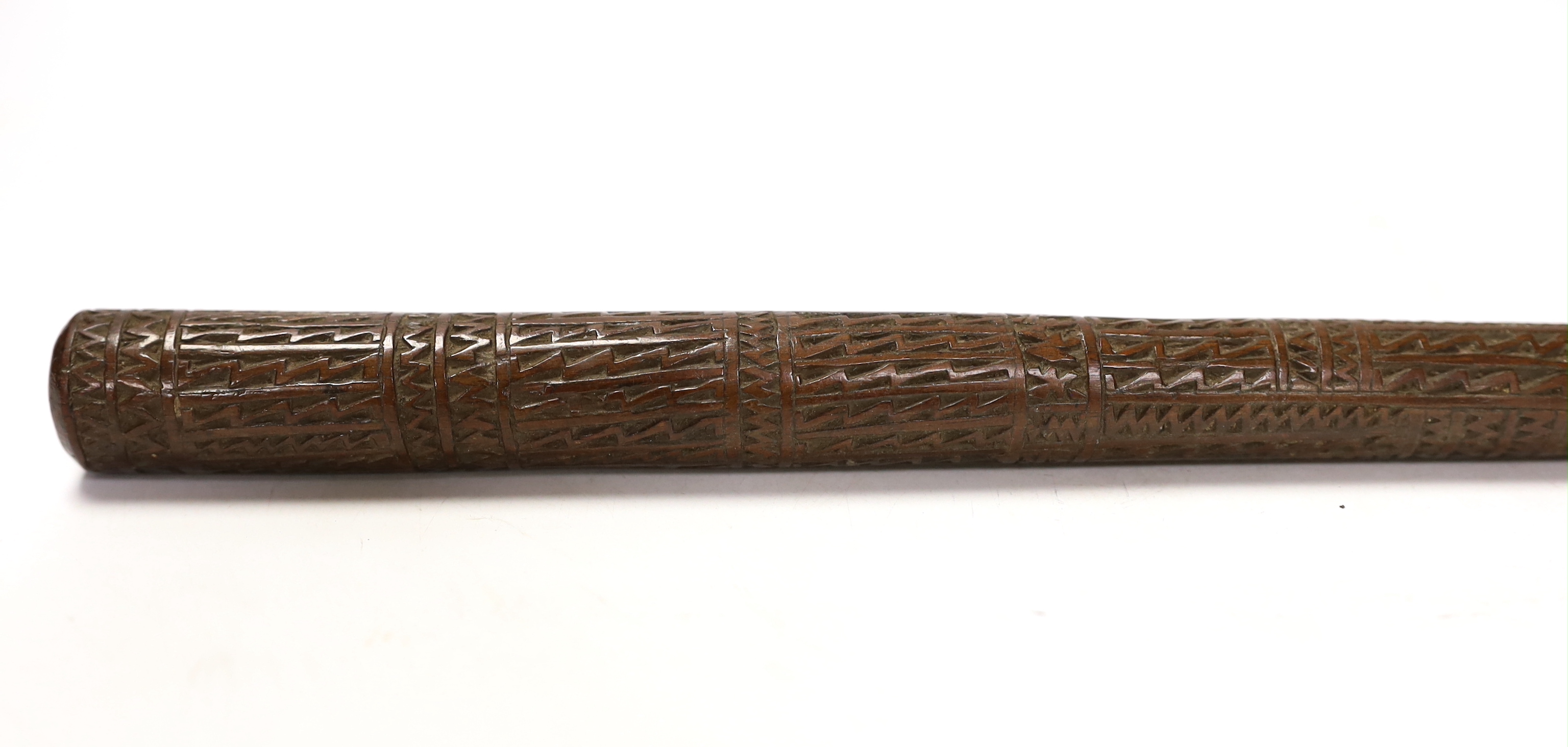 A South Seas carved hardwood fid, 35.5cm